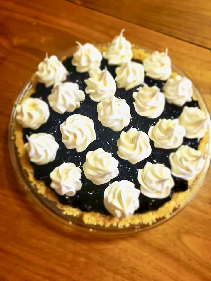 the same pie with swirls of meringue