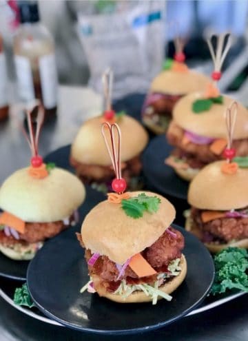 Plate full of Asian inspired chicken fried sandwich.