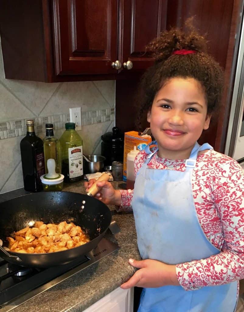 My student at the stove.