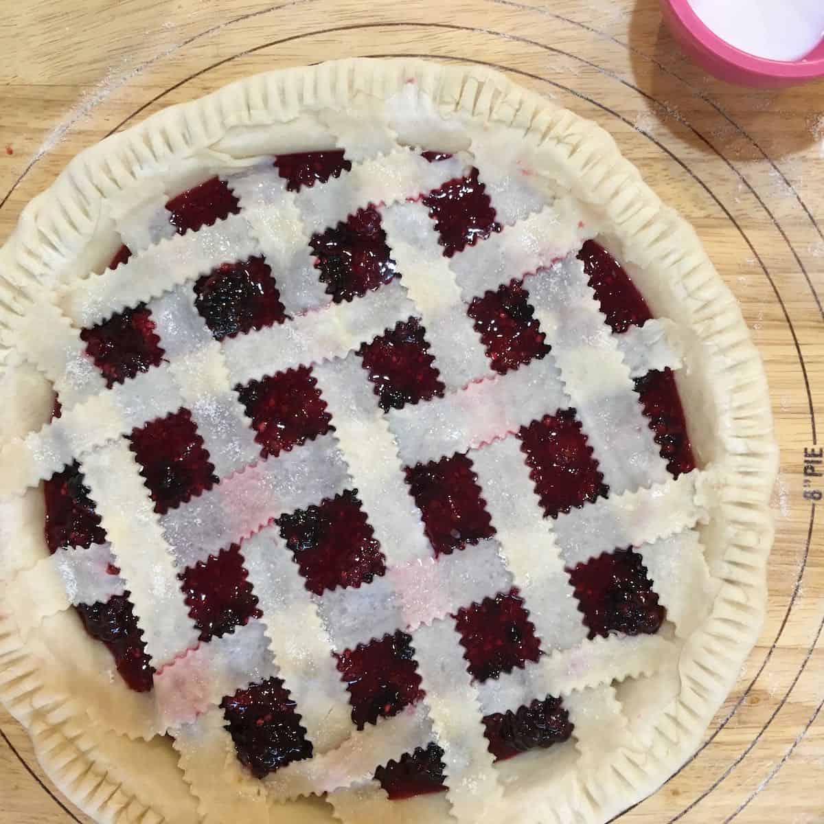 Unbaked lattice berry pie.