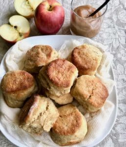 Easy Apple Butter Biscuits plated with apples and apple butter.