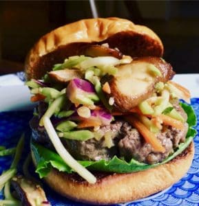 Stir fry shitake burger with slaw.