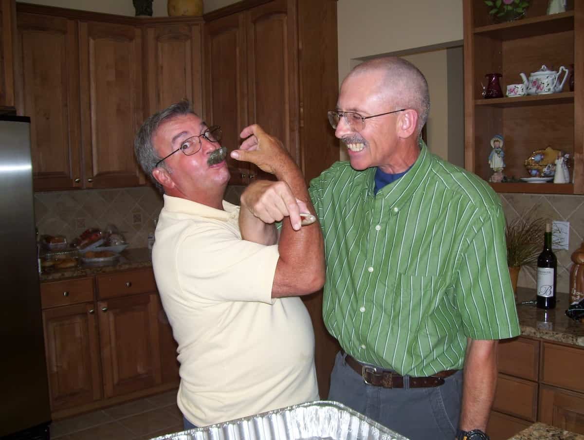 My brother and husband slurping clams on the half shell.