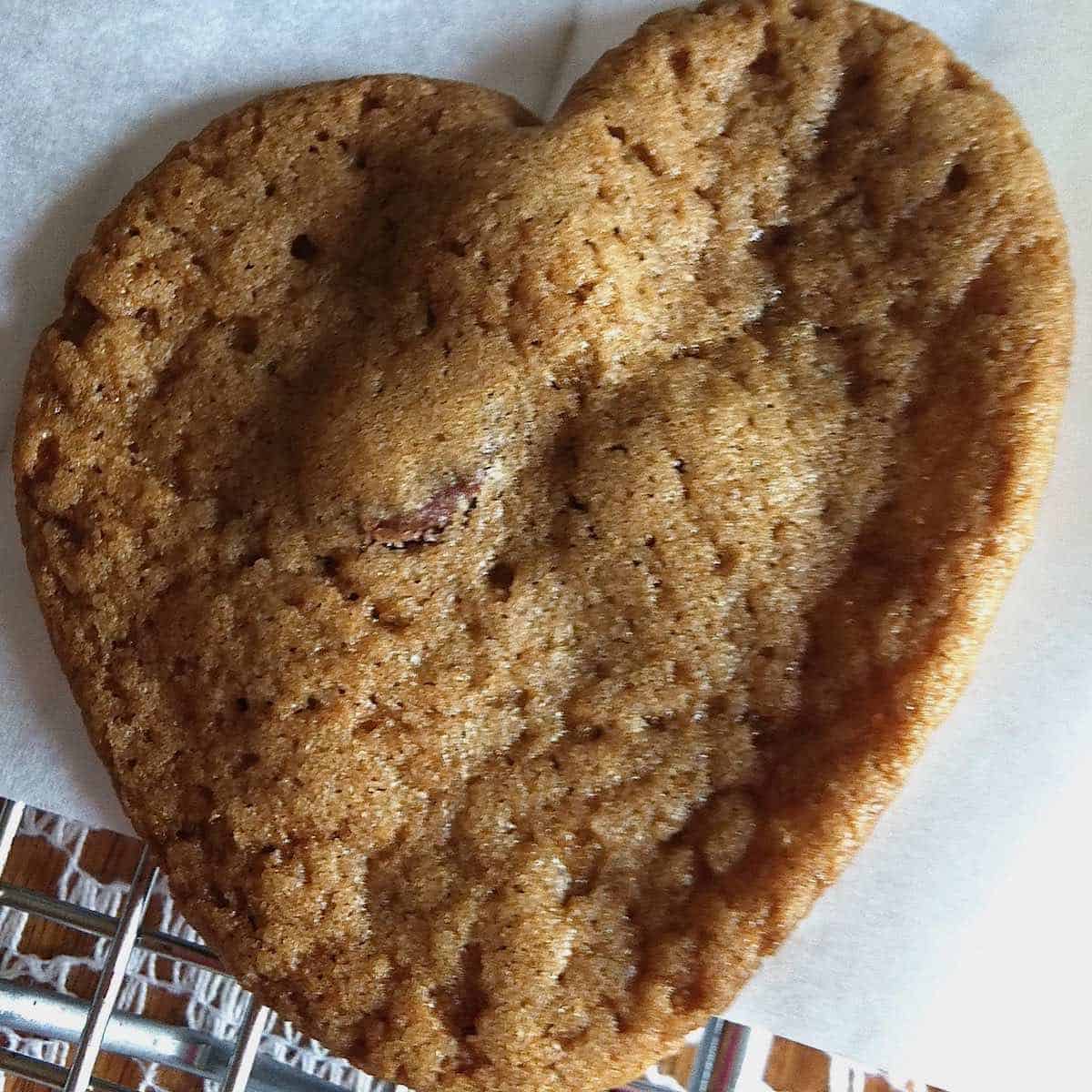 Following in his light with a heart shaped cookie.