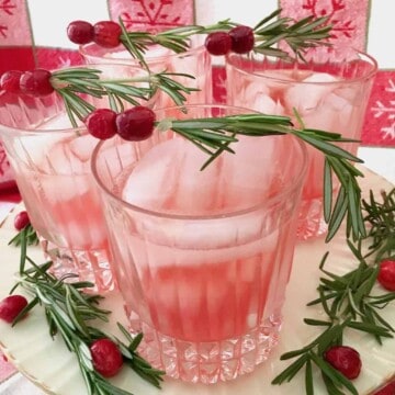 Glasses of cranberry pear rosemary spritzer best cranberries for all seasons.