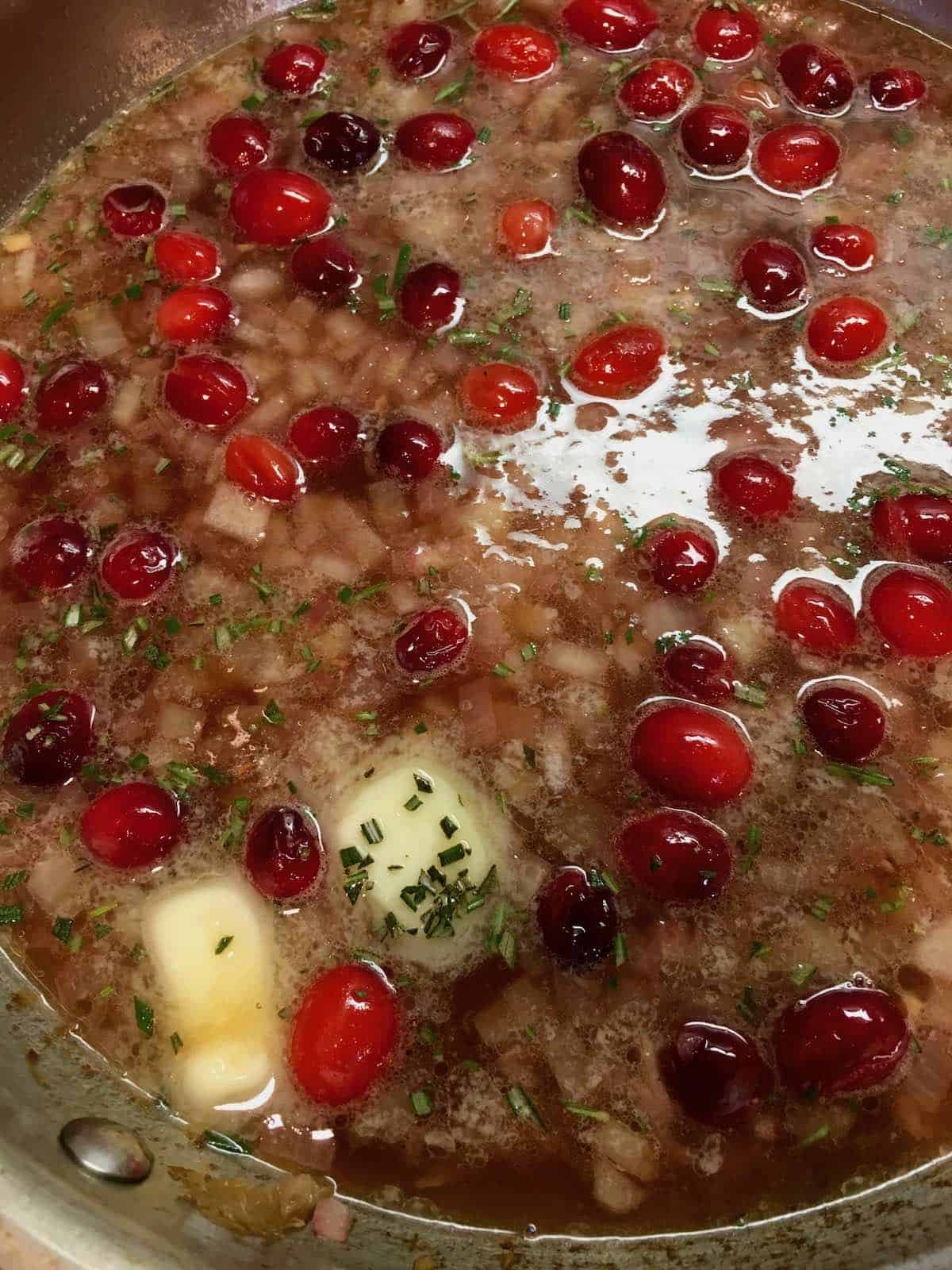 Pan of cranberry agrodolce sauce is a best cranberry recipe.