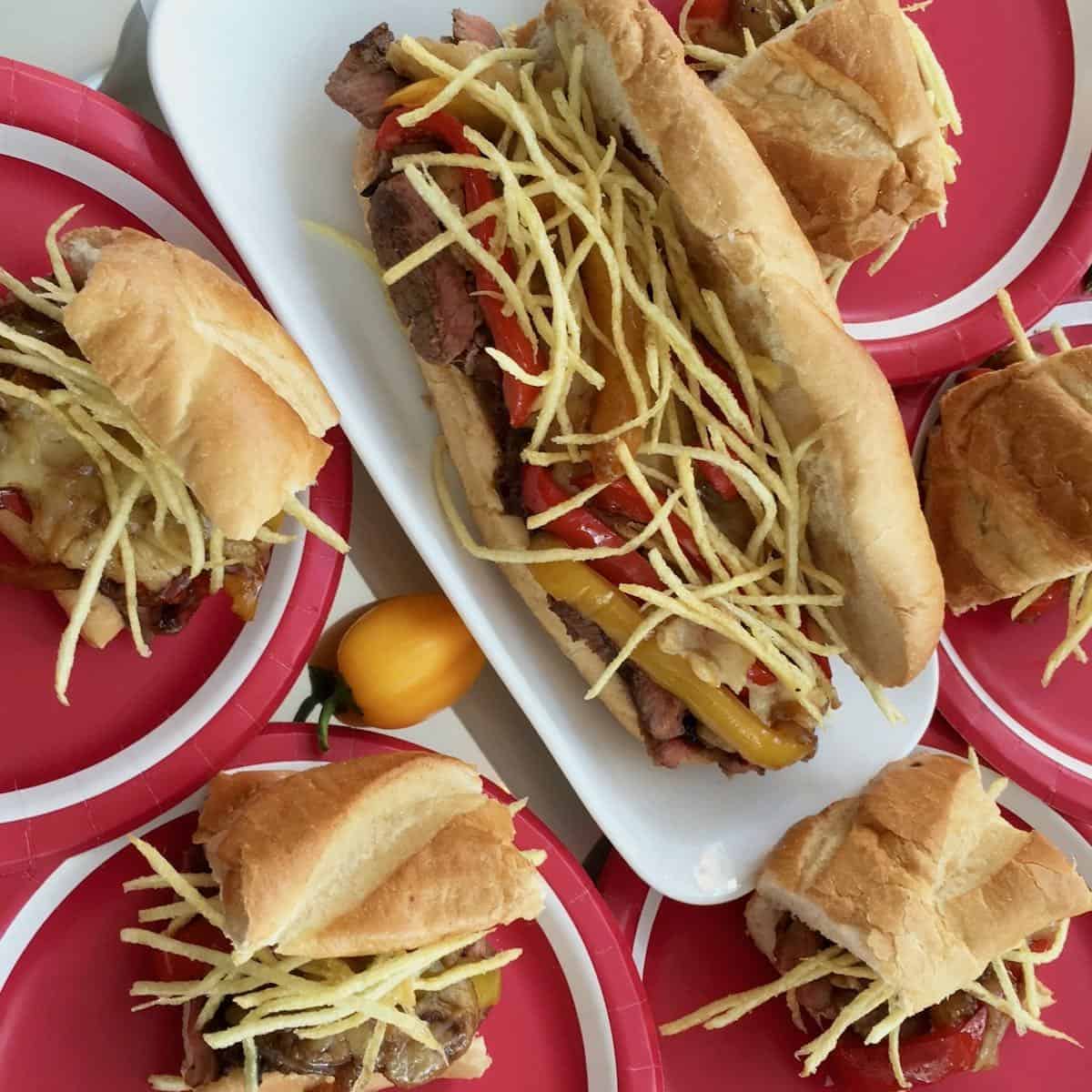 Steak sandwiches with crispy potato strings.