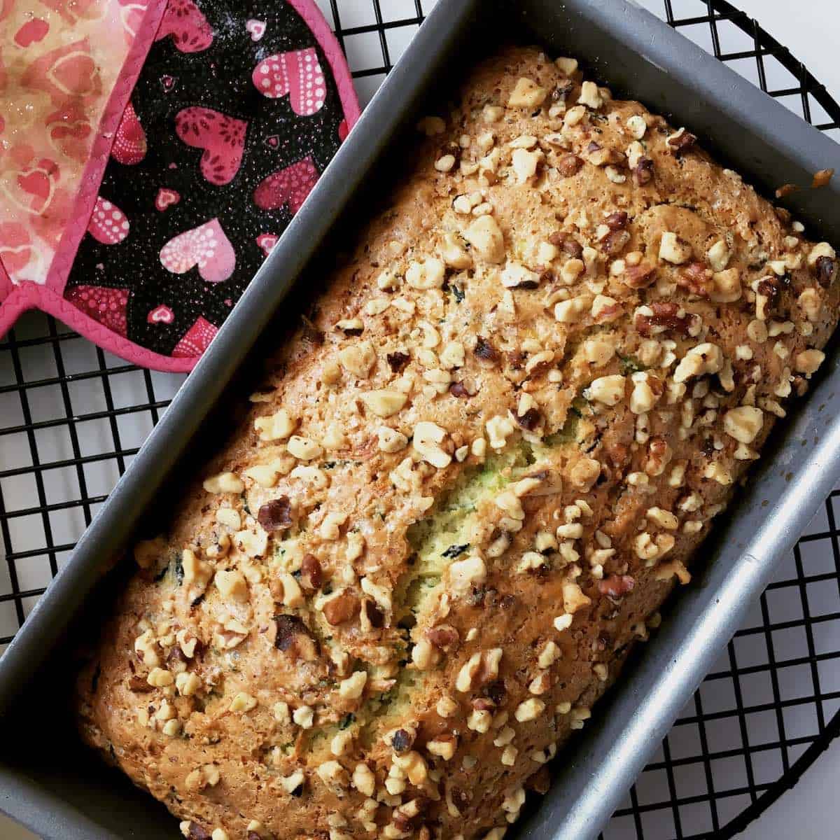 Funfetti zucchini bread on cooling rack.