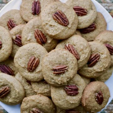 Plate of baked pecan cookies.