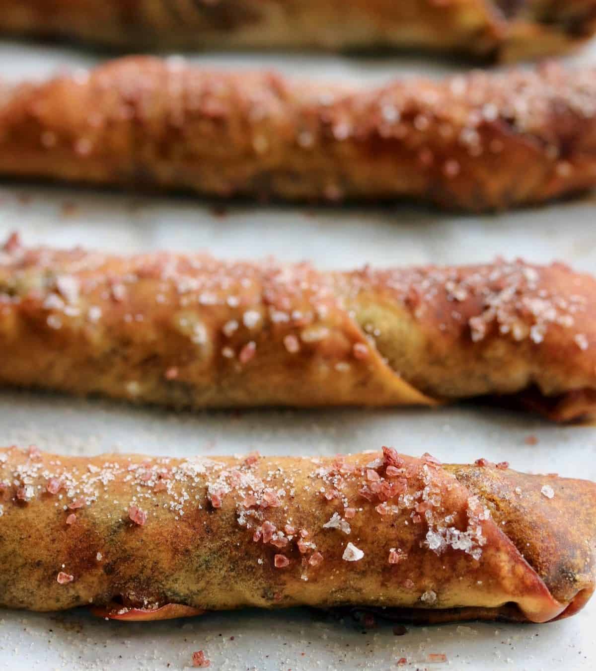 egg roll pretzel sticks on baking sheet