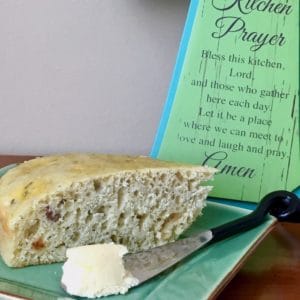 plated Irish soda bread with butter and a kitchen prayer