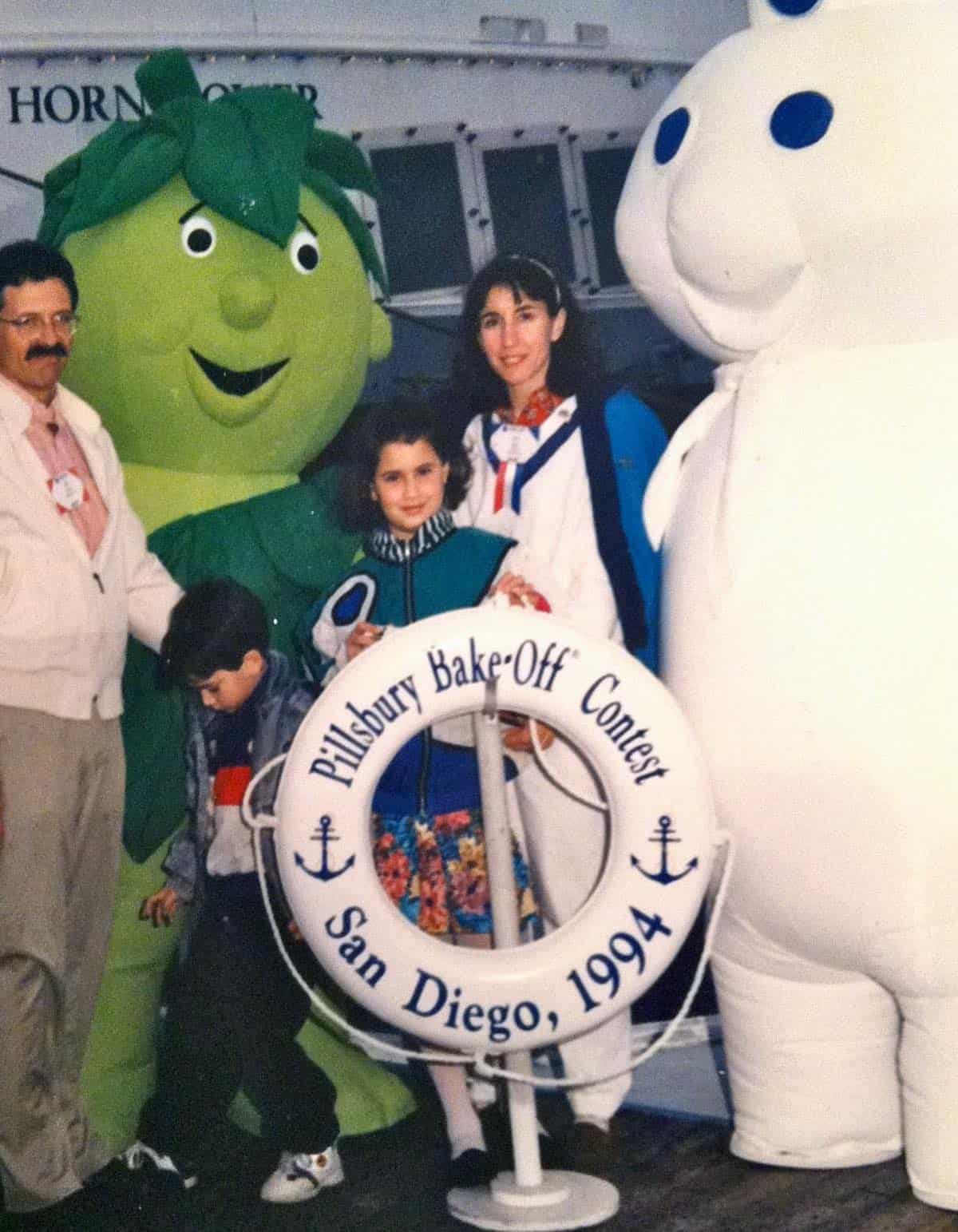 William stepping on the Green Giant's Sprout foot at the Pillsbury bake0ff with my family and doughboy