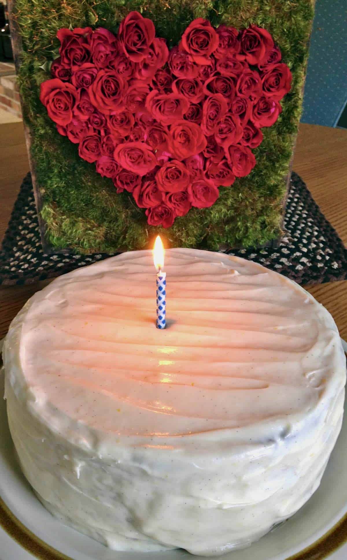 Birthday cake with red rose heart.