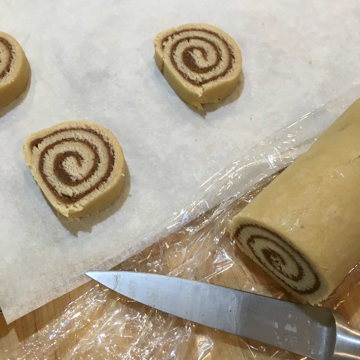 Cutting rolled dough.