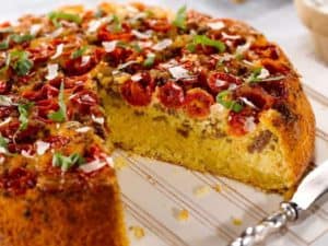 Sweet Yellow Cornbread, Sausage and Tomato Pie with a Garlic Cream Drizzle