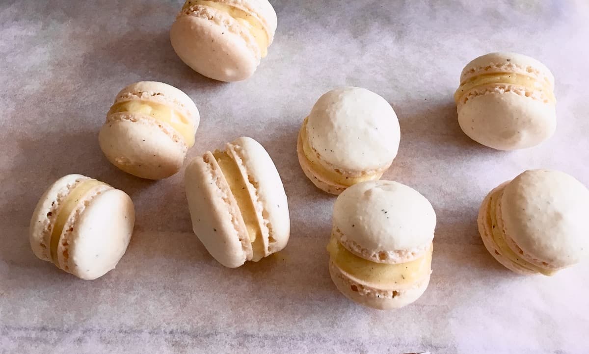 Baked and filled vanilla macarons.