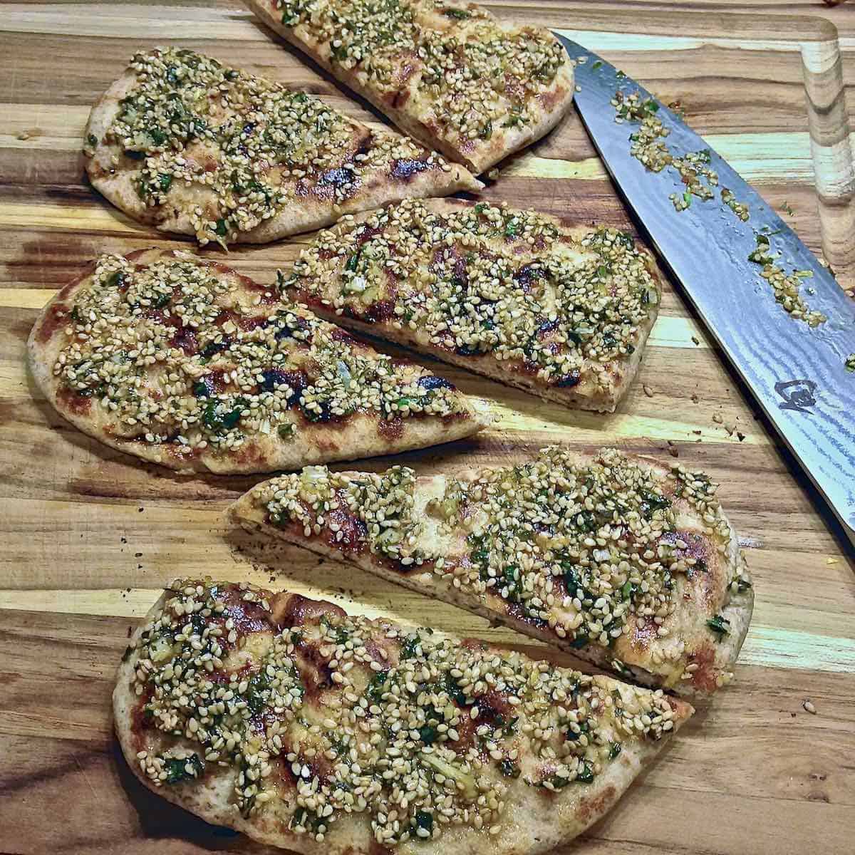 Fresh zahtar topped naan bread.