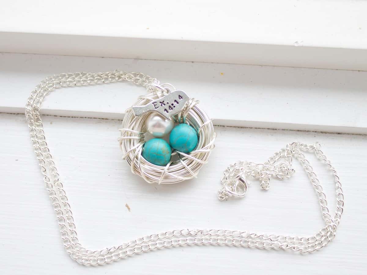 Nest egg necklace.