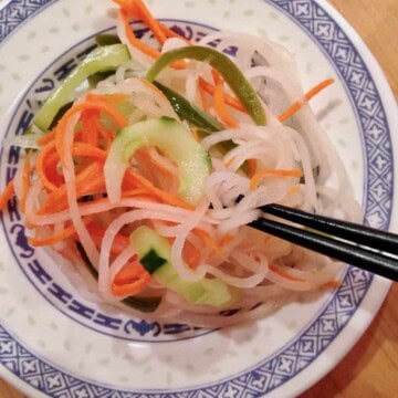 Crispy, tangy and sweet quick smoke pickle of carrot, daikon, jalapeño and cucumber.