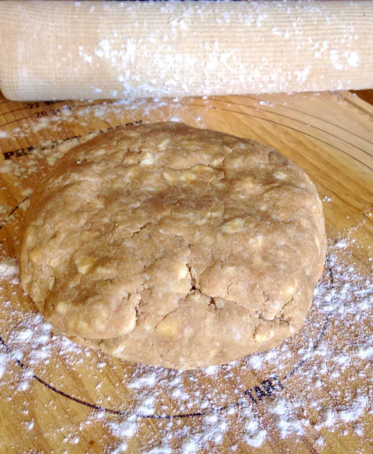 A proper pie dough speckled with bits of butter and lard.