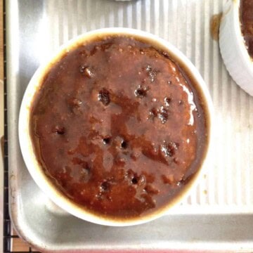 Poke the holes through to the bottom of the Spirited Sticky Toffee Pudding cake.