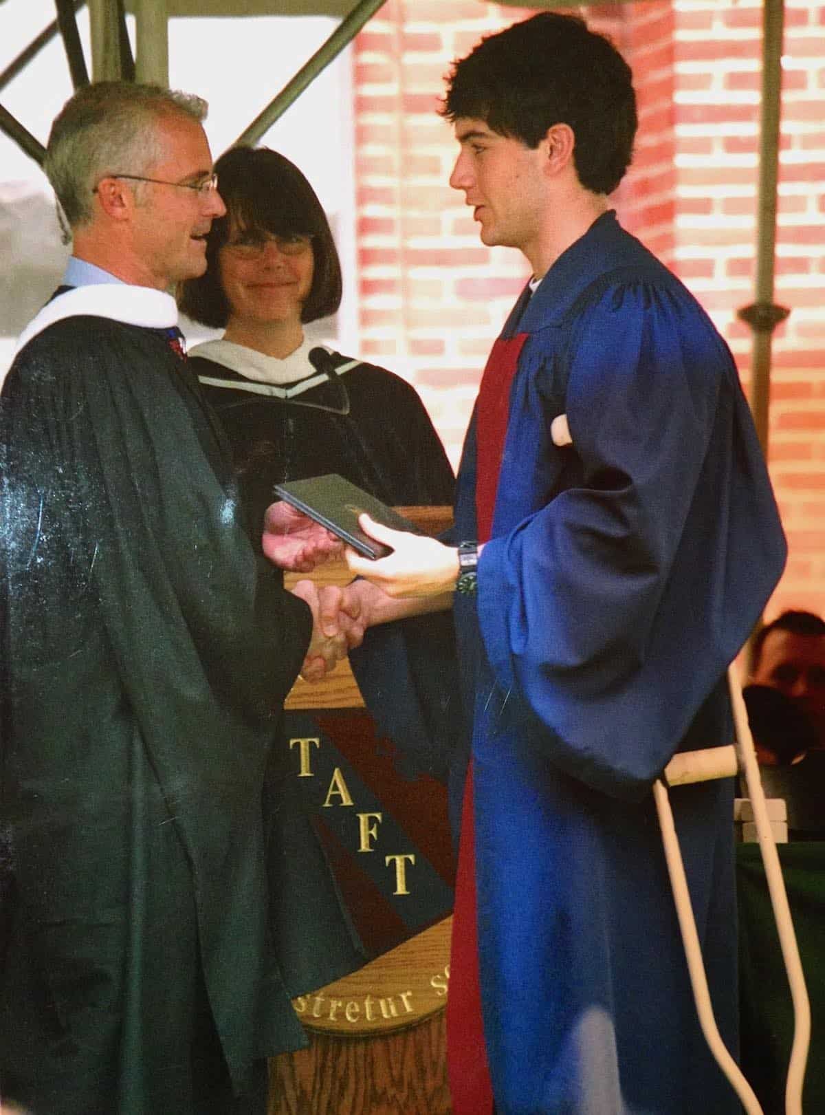 Oh, happy day his high school diploma in hand.