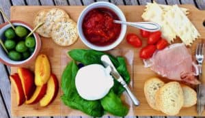 Life on the deck is delicious with fruit and cheese board.