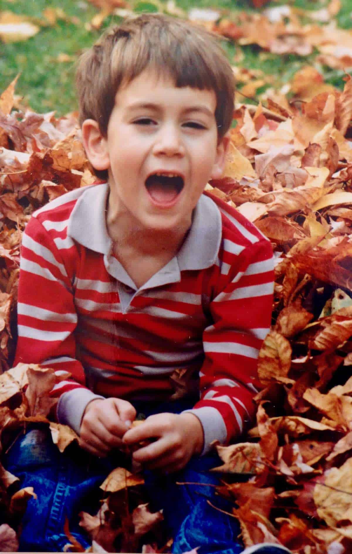 Doesn't every boy love jumping into a pile of leaves.