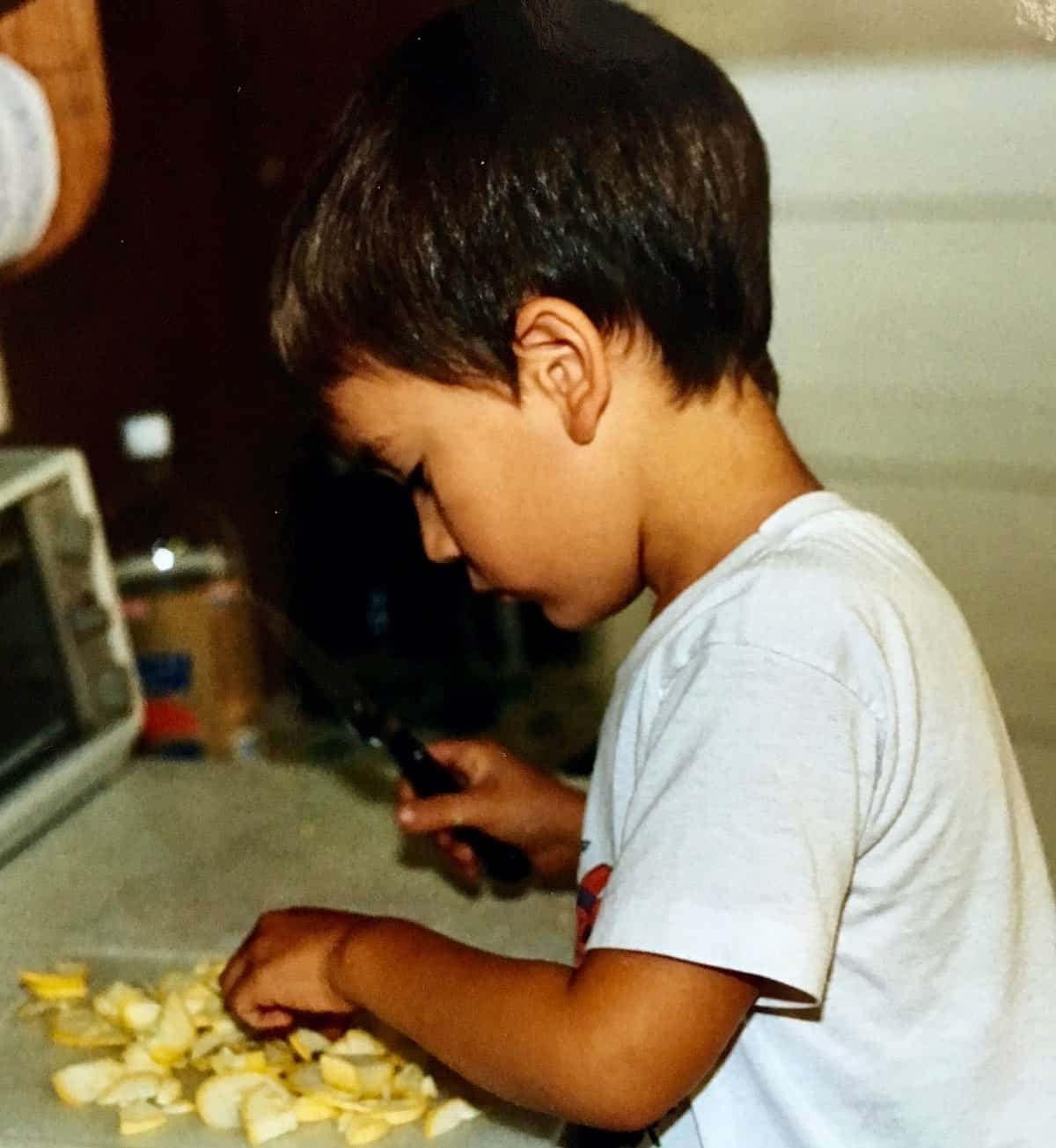 William as a toddler doing some cooking.