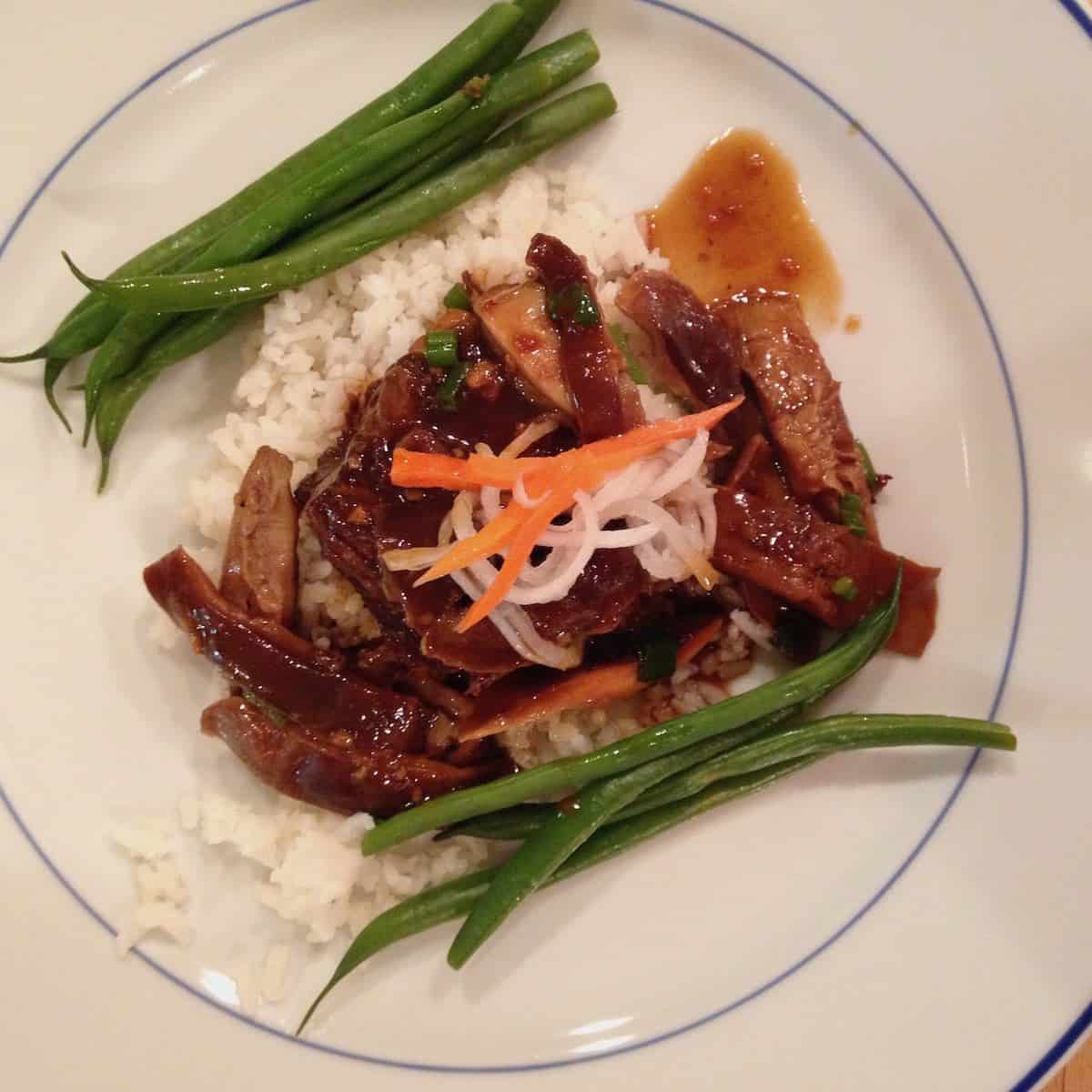 Asian short ribs with shitakes, pickled daikon/carrot, golden Carolia rice and haricot vert.