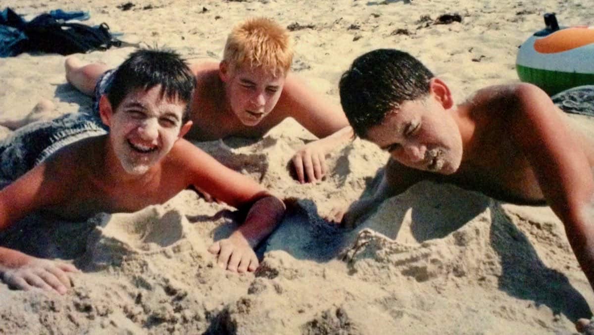 A typical day at the beach with Andrew, Tyler and William.