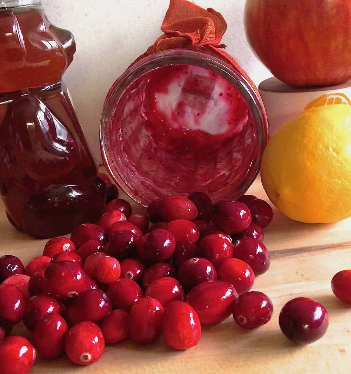 An empty jar of Festive Cranberry-Apple Relish cranberries, lemon and honey.