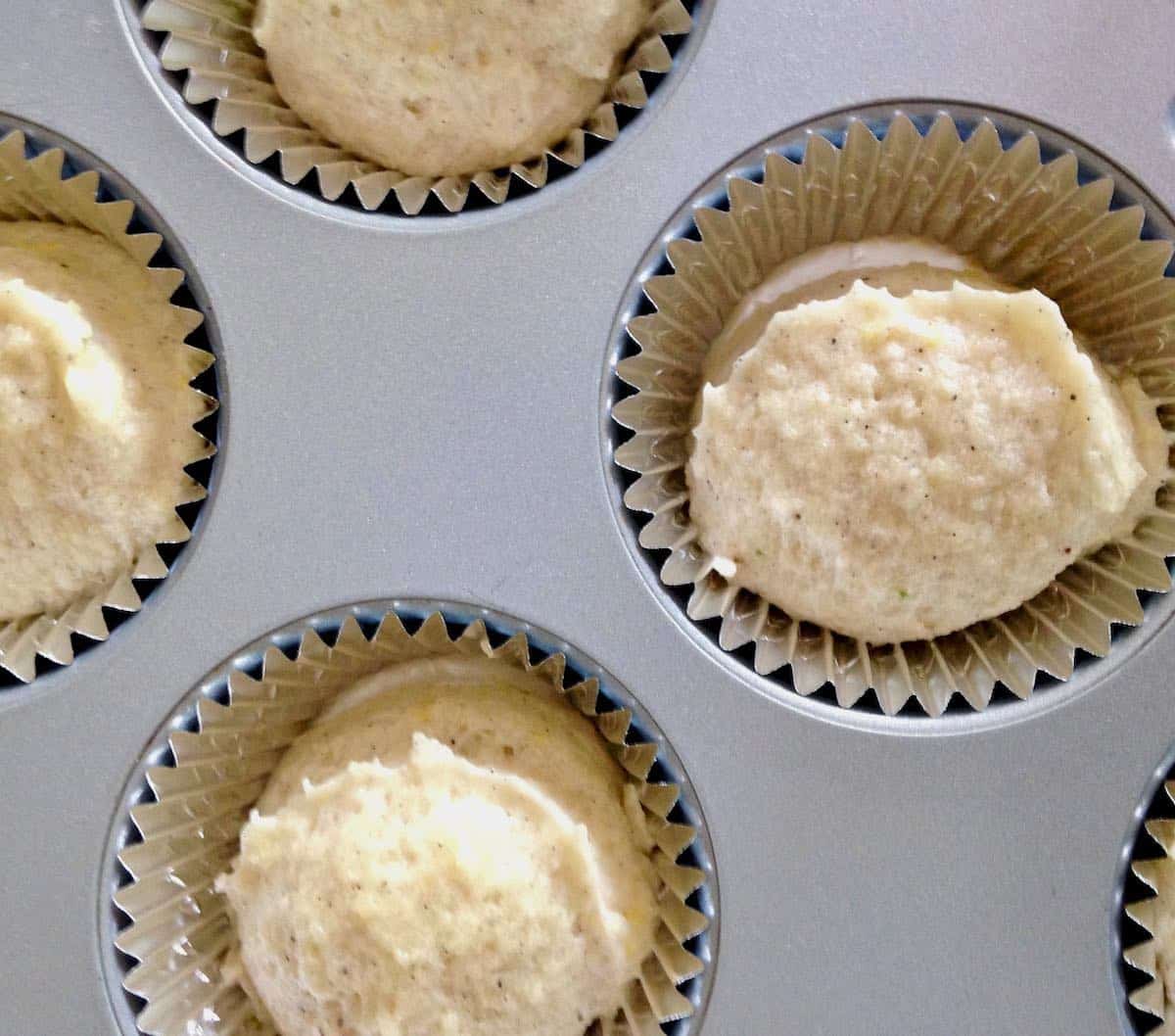 baked with butter--see the difference in the batter? little blackberry almond cakes