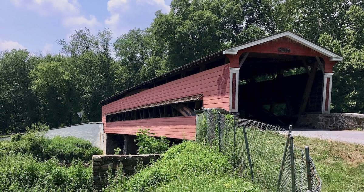 Crossing the red covered bridge. 