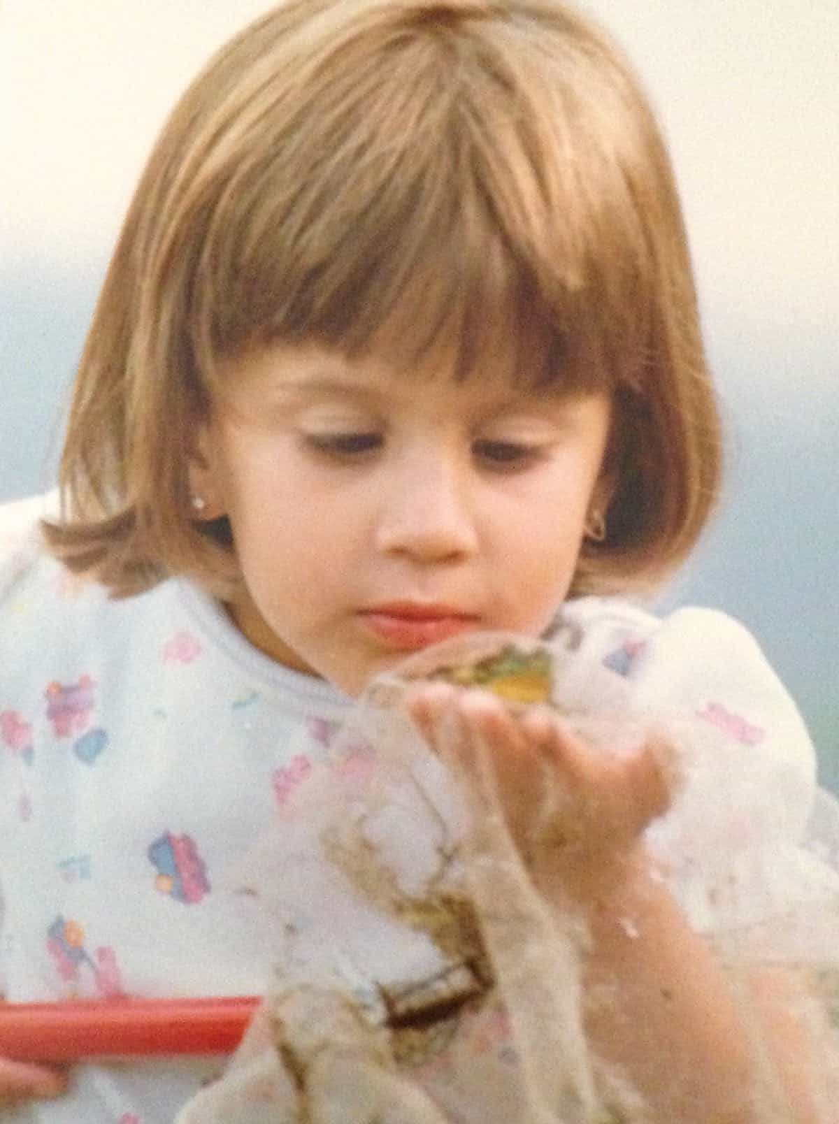 My daughter catching garden toads.