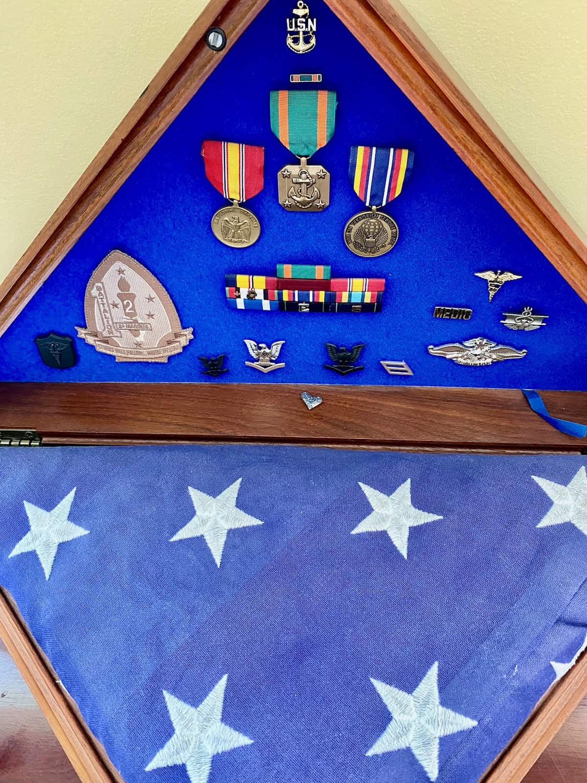 Memorial flag and medals.