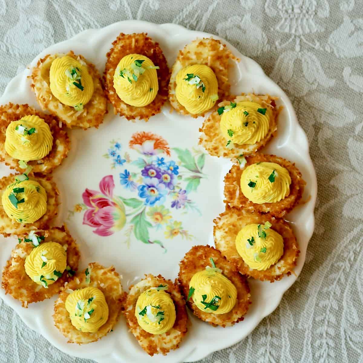 Plate of crispy coconut curried devils eggs.