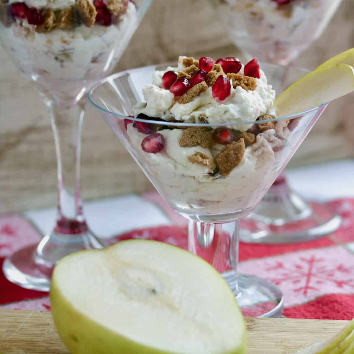 Roasted pear fool crunch served in martini glass.