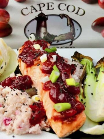 Grilled Cranberry Glazed Salmon In Banana Leaf With Cranberry Cauliflower Rice.
