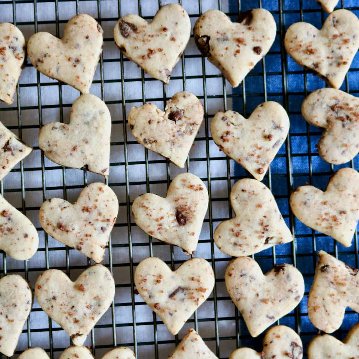 Heart shaped shortbread cookies cooling.