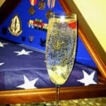 Sweet William's Spirited Sparkler flute and his mission accomplished military medals.