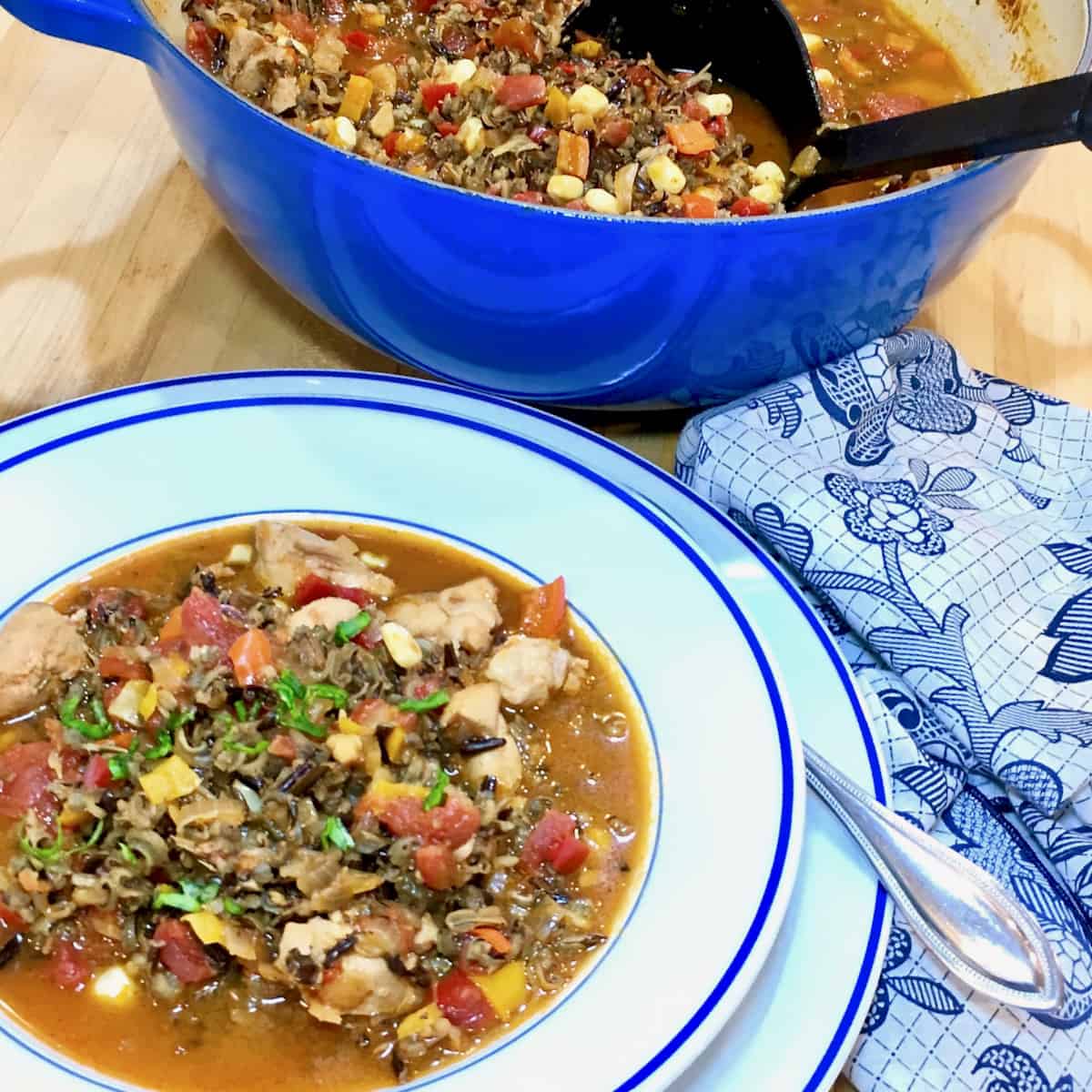 Your favorite recipe for 2017 wild rice chicken soup and pot of soup with ladle.