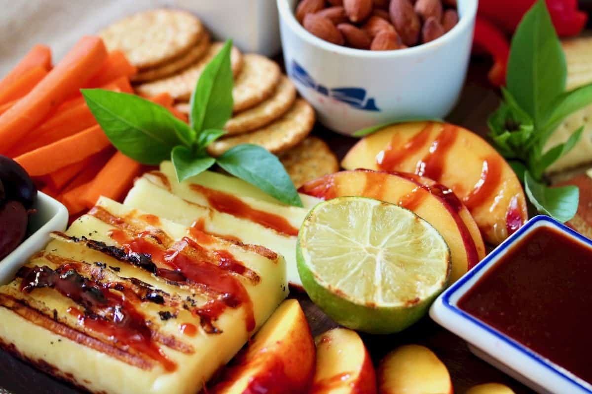 Healthier Holiday Cheese Board featuring gochujang glaze
