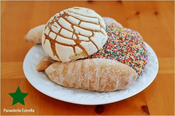 a plate of rolls from a local bakery inspiration for unusual homemade Christmas cookies