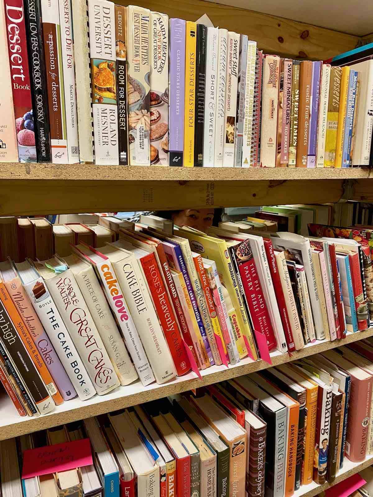 shelves of cookbooks in the culinary cellar