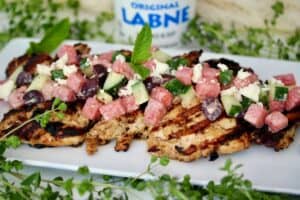 Labne marinated grilled chicken with cucumber-melon salad.