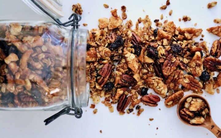 Pie crust granola spilling out of jar.