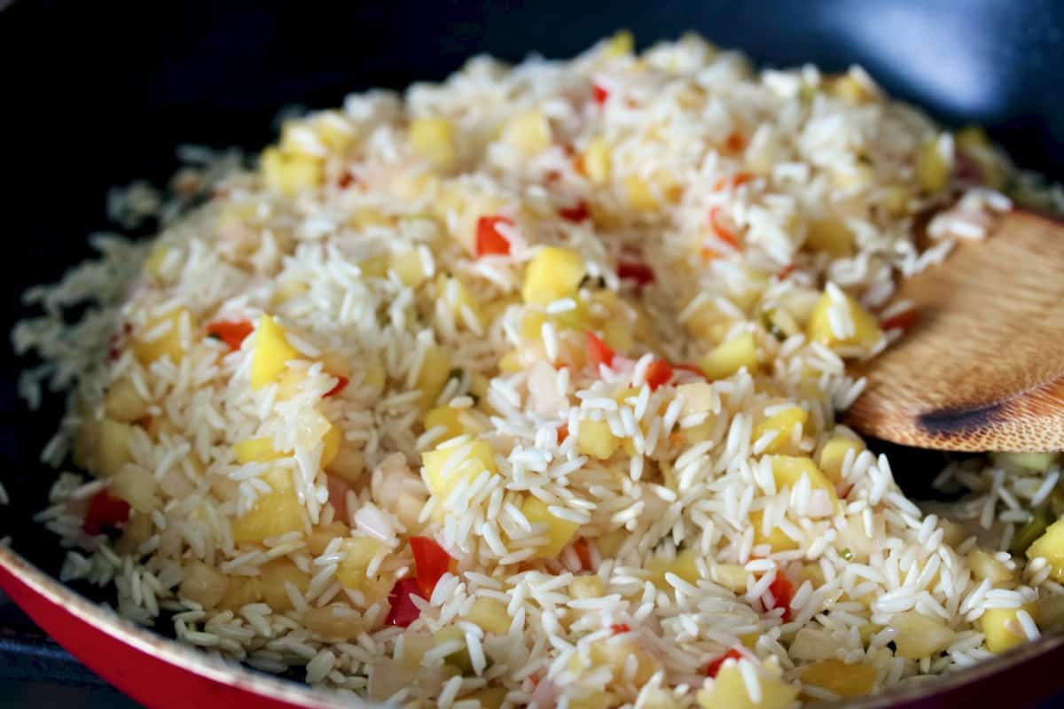 Cooking rice using the pilaf method.