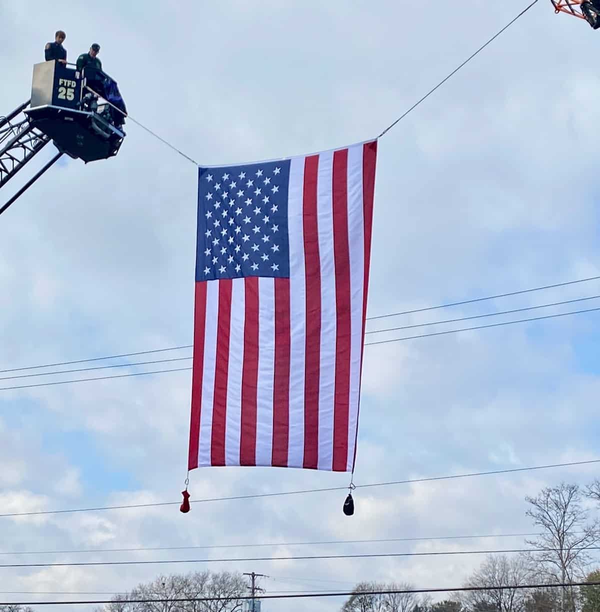 American flag flying high triggers the grief of a teenager.