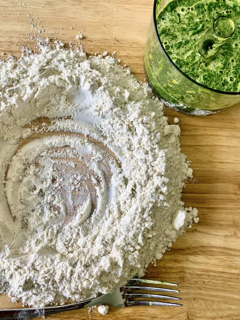 Flour, salt, ramps and egg yolks mixed together for the ramp pasta dough.